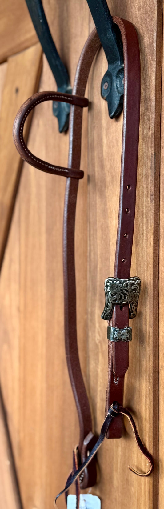 3/4” slip ear bridle with single antique silver scrolled floral buckle