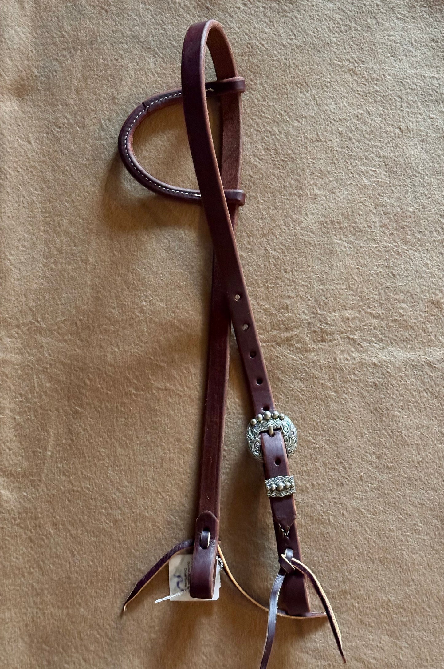 3/4” slip ear bridle with single scrolled antiqued silver dotted buckle