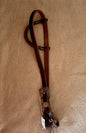 3/4” slip ear bridle with single copper flower and purple buckle
