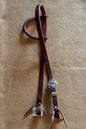 3/4” slip ear bridle with single scrolled antiqued silver dotted buckle